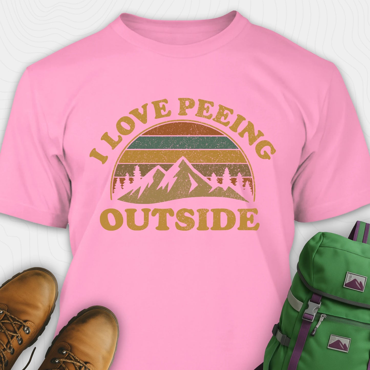 Pink I pee outside shirt with retro mountain graphic