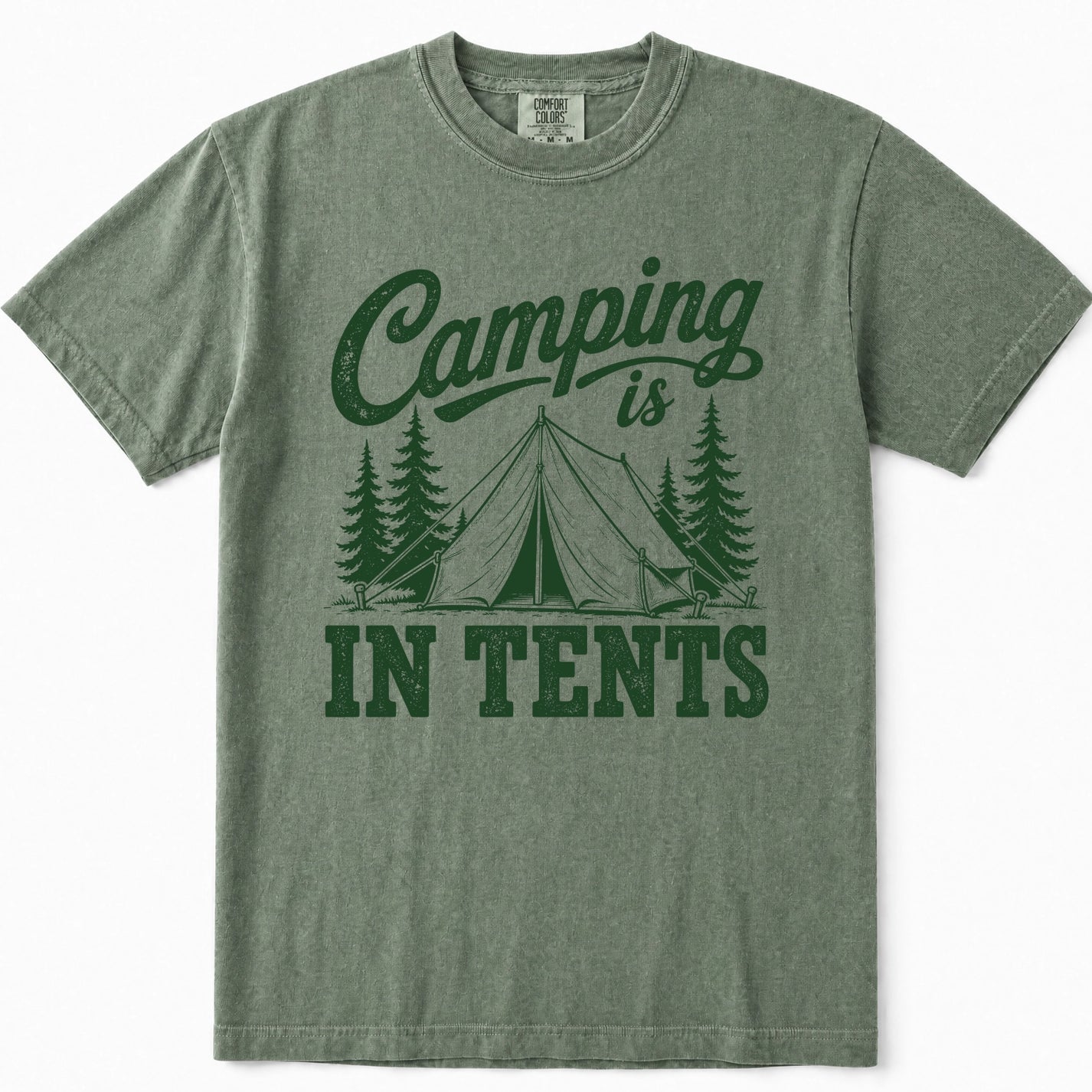 Moss green crewneck t-shirt featuring a dark green graphic print that reads 'Camping is IN TENTS' with an illustration of a tent and pine trees, shown flat against a white background.