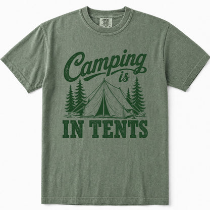 Moss green crewneck t-shirt featuring a dark green graphic print that reads 'Camping is IN TENTS' with an illustration of a tent and pine trees, shown flat against a white background.
