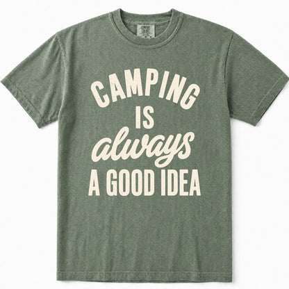 Moss green crewneck t-shirt with a cream-colored graphic text print that reads 'CAMPING IS always A GOOD IDEA'.