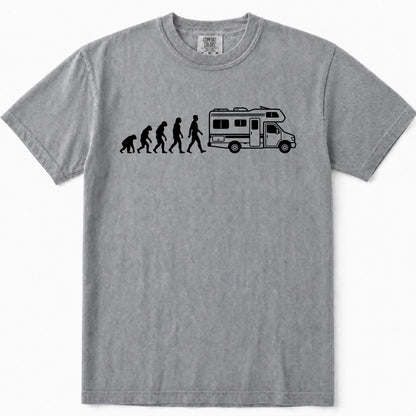 Grey short-sleeve crewneck t-shirt featuring a black graphic print of the evolution sequence leading to a walking person next to an RV.