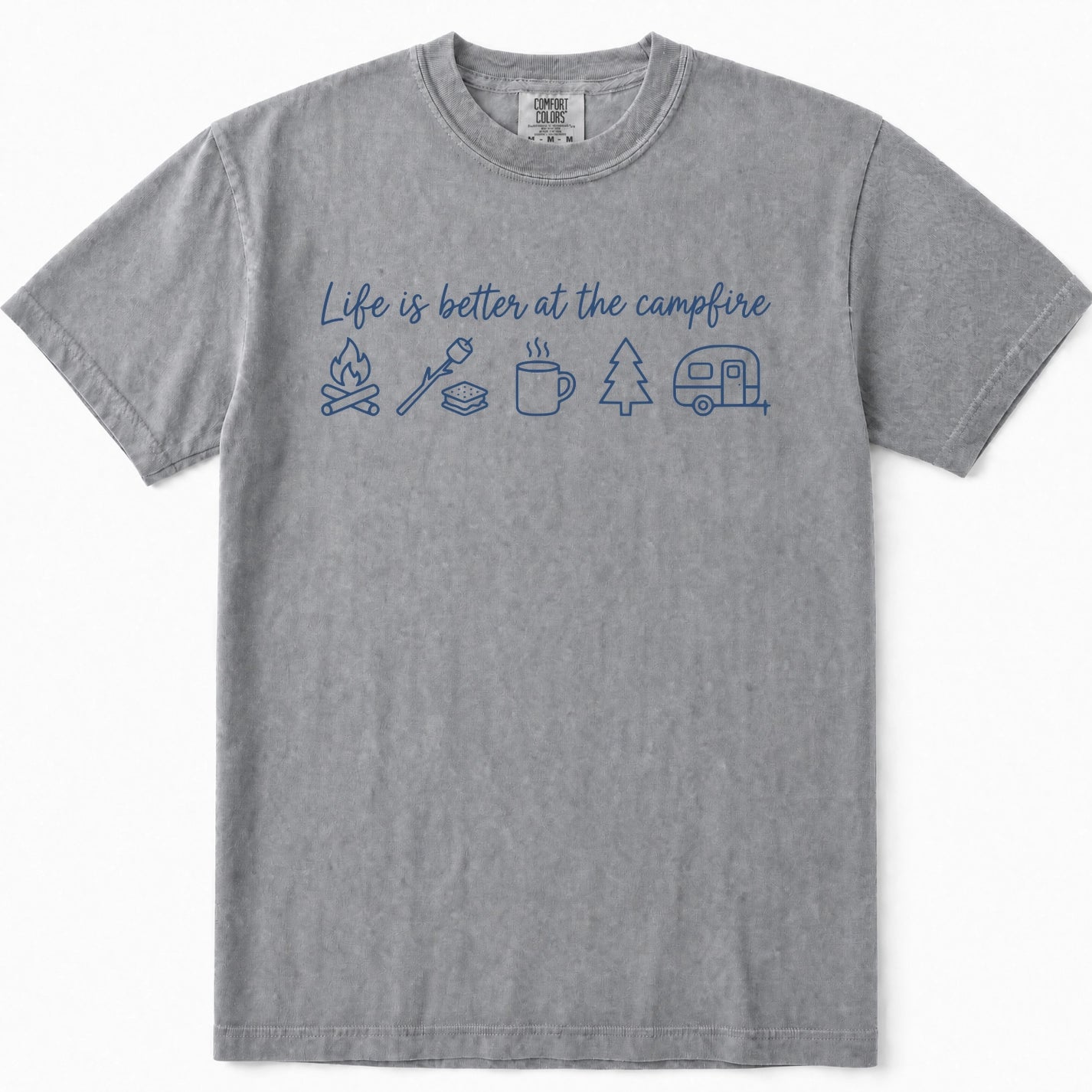Grey short-sleeve crewneck t-shirt featuring a blue graphic print on the front with the text 'Life is better at the campfire' and simple icons for a campfire, marshmallow, mug, pine tree, and camper trailer.