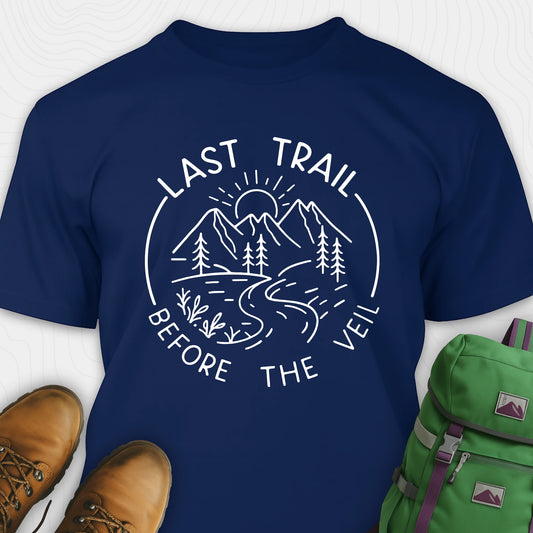 Navy nature-themed Last Trail Before the Veil shirt with line-art mountain scene.