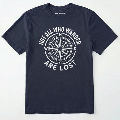 Navy not all who wander are lost t-shirt with compass design and text on a white background.