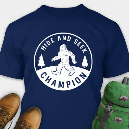 Navy bigfoot hide and seek champion shirt with forest emblem
