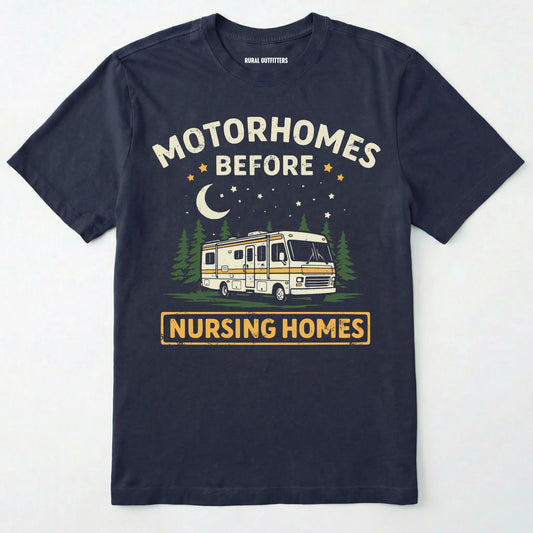 Navy blue t-shirt with a graphic of a retro class a motorhome and text 'Motorhomes Before Nursing Homes' on a white background.