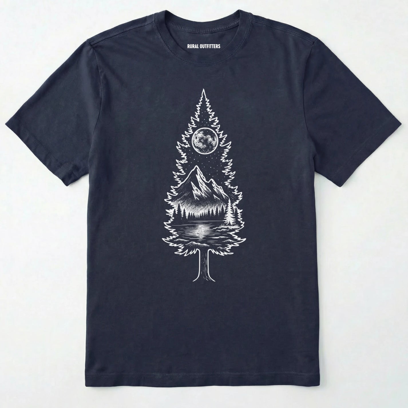 Navy tree t-shirt featuring a detailed white graphic of a pine tree silhouette. the tree outline contains a landscape scene: a mountain peak rising over a forested shoreline, with its reflection visible in a lake below. above the mountain is a starry night sky and a full or partial circle representing the moon or sun.
