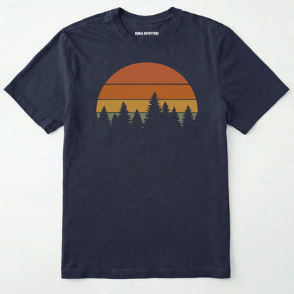 Navy vintage sunset t-shirt with retro forest silhouette graphic on a white background.