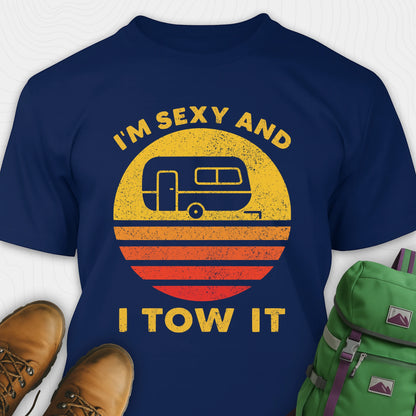 Navy trailer shirt with retro camper and sunset graphic, and "I'm sexy and I tow it" text