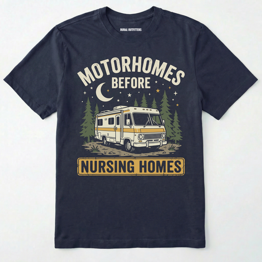Navy blue t-shirt with a graphic of a motorhome and text 'Motorhomes Before Nursing Homes' on a white background.