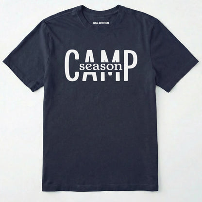 Navy camp season shirt in simple bold text on a white background.