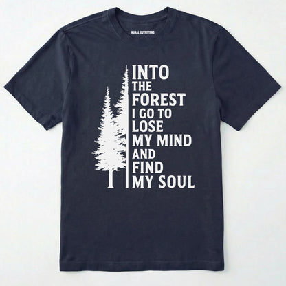 Navy into the forest i go t-shirt with white forest graphic and tall trees design on a white background.