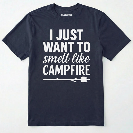 Navy I just want to smell like campfire t-shirt with a marshmallow on a stick graphic on a white background.