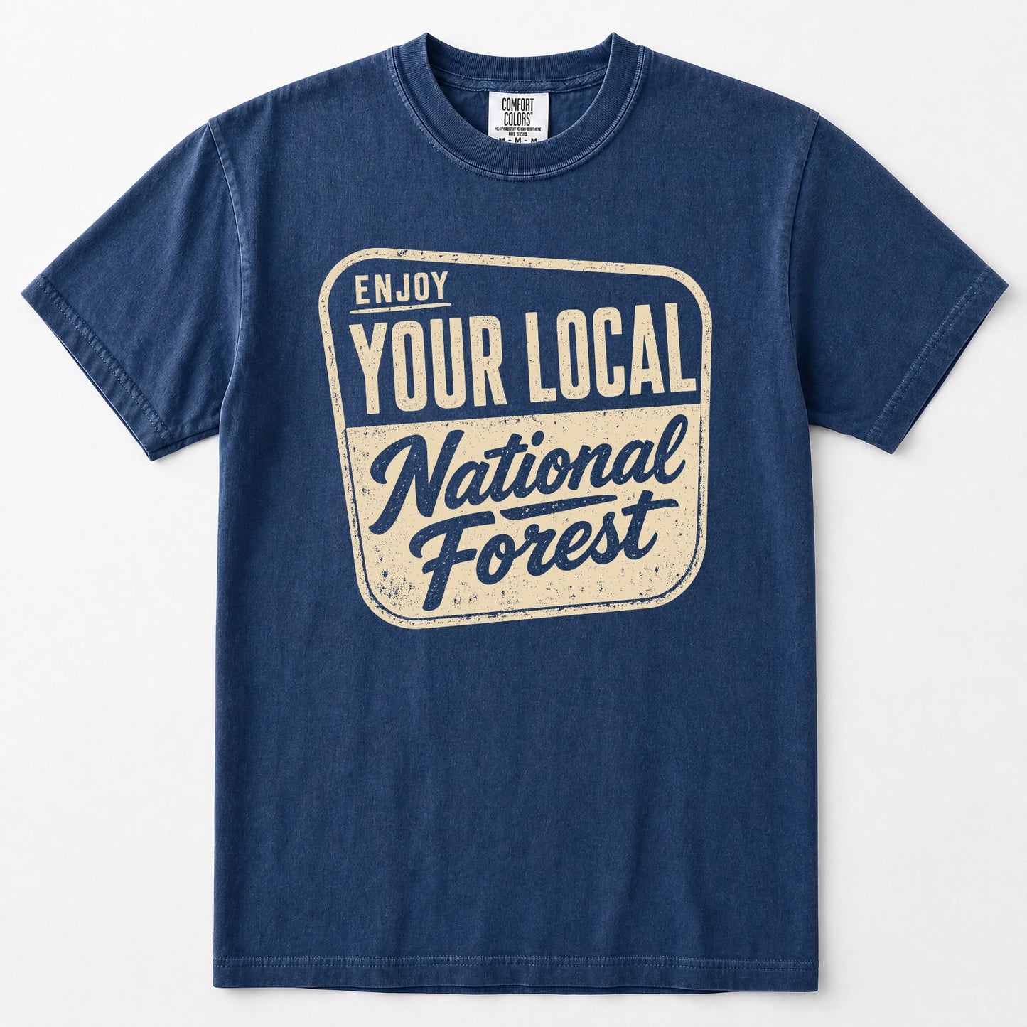 Navy blue short-sleeve t-shirt with a distressed cream-colored graphic on the front that reads 'ENJOY YOUR LOCAL National Forest'.