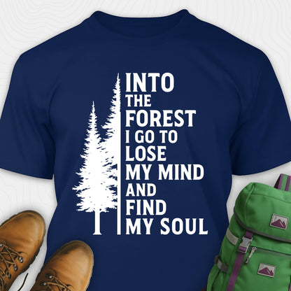 Navy into the forest I go t-shirt with white forest graphic and tall trees design