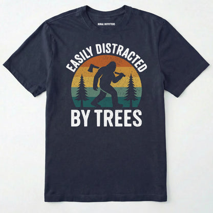 Navy funny sasquatch shirt featuring bigfoot silhouette and trees on a white background.