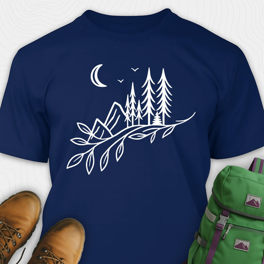 Navy nature graphic t-shirt showing mountains, pine trees, and moon line art