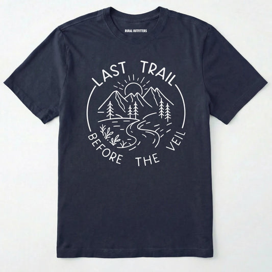 Navy nature-themed Last Trail Before the Veil shirt with line-art mountain scene on a white background.