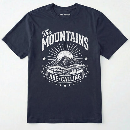 Navy t-shirt with white mountain graphic and text on a light grey background