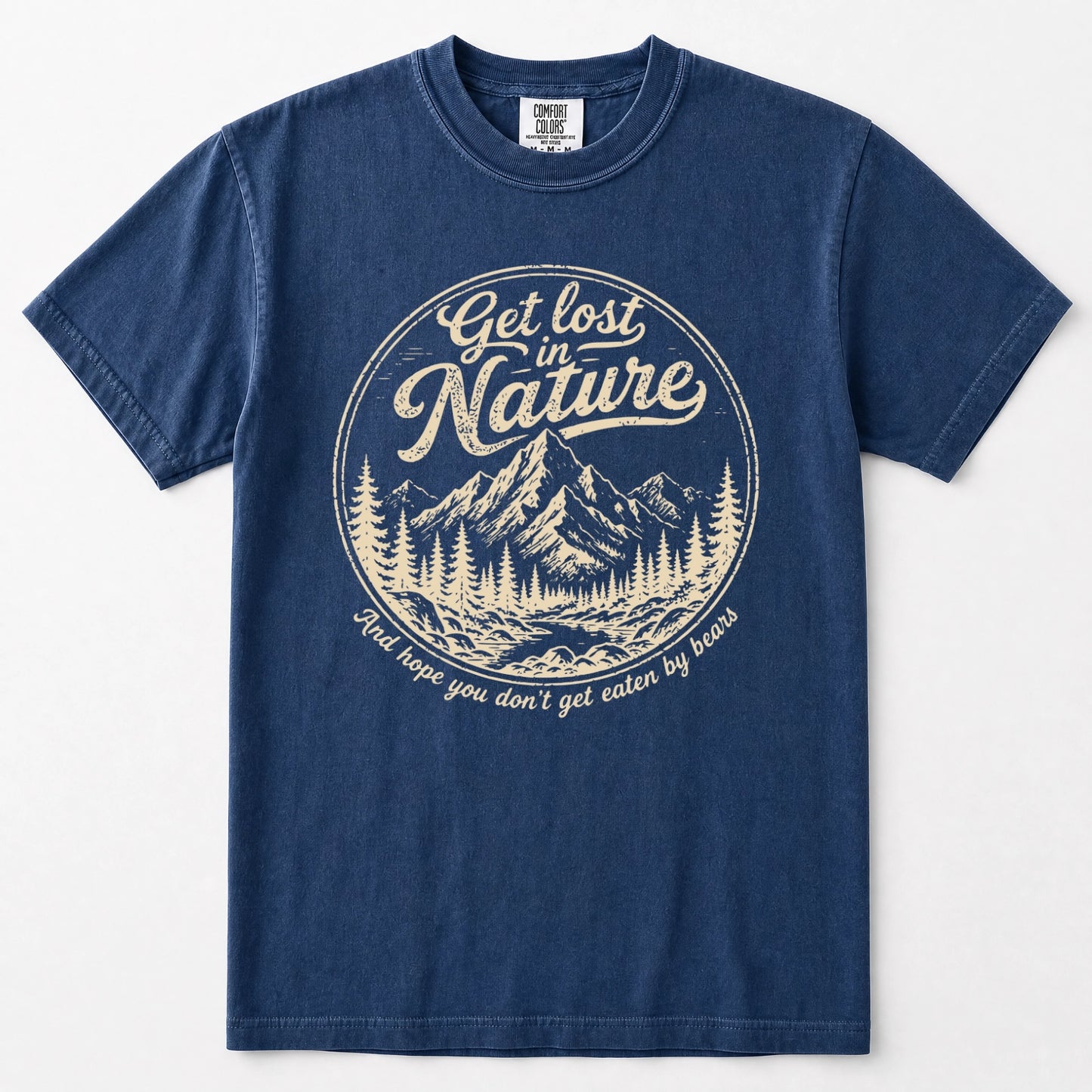 Navy blue short-sleeve t-shirt with a vintage-style circular graphic on the chest. The graphic features a cream-colored mountain and pine tree illustration with the text 'Get lost in Nature' and 'You hope you don't get eaten by bears'.
