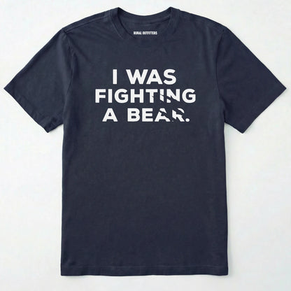 Navy i was fighting a bear shirt with a bear scratch mark graphic on a white background.