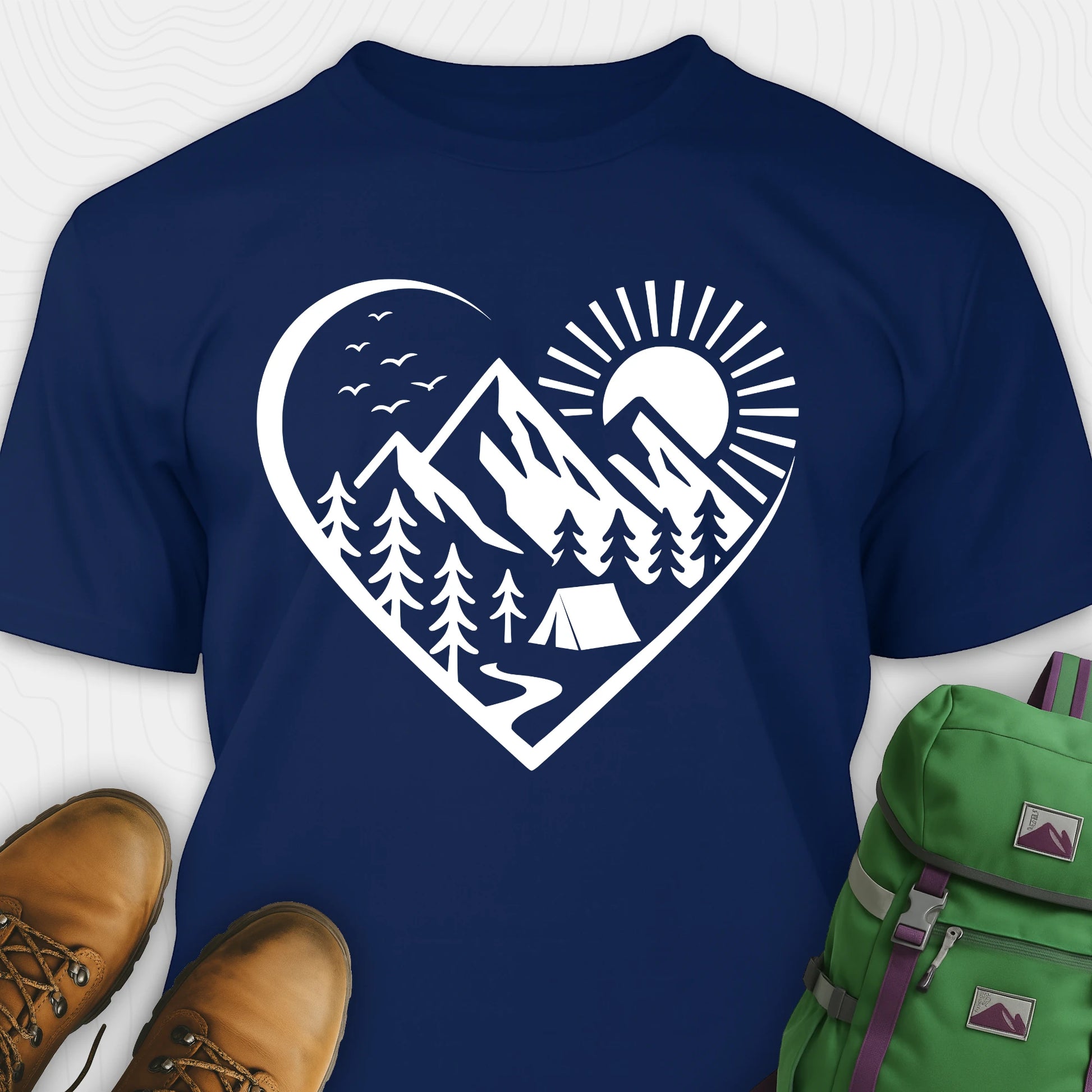 Navy nature t-shirt featuring heart graphic with mountains, trees, and tent illustration
