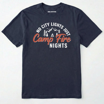 Navy campfire shirt with mountains and trees design and "no city lights just campfire nights" text on a white background.