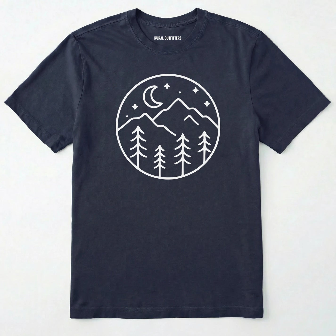 Navy moon and stars shirt with minimalist mountain and forest design on a white background.