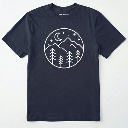 Navy moon and stars shirt with minimalist mountain and forest design on a white background.