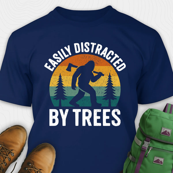 Navy funny sasquatch shirt featuring bigfoot silhouette and trees