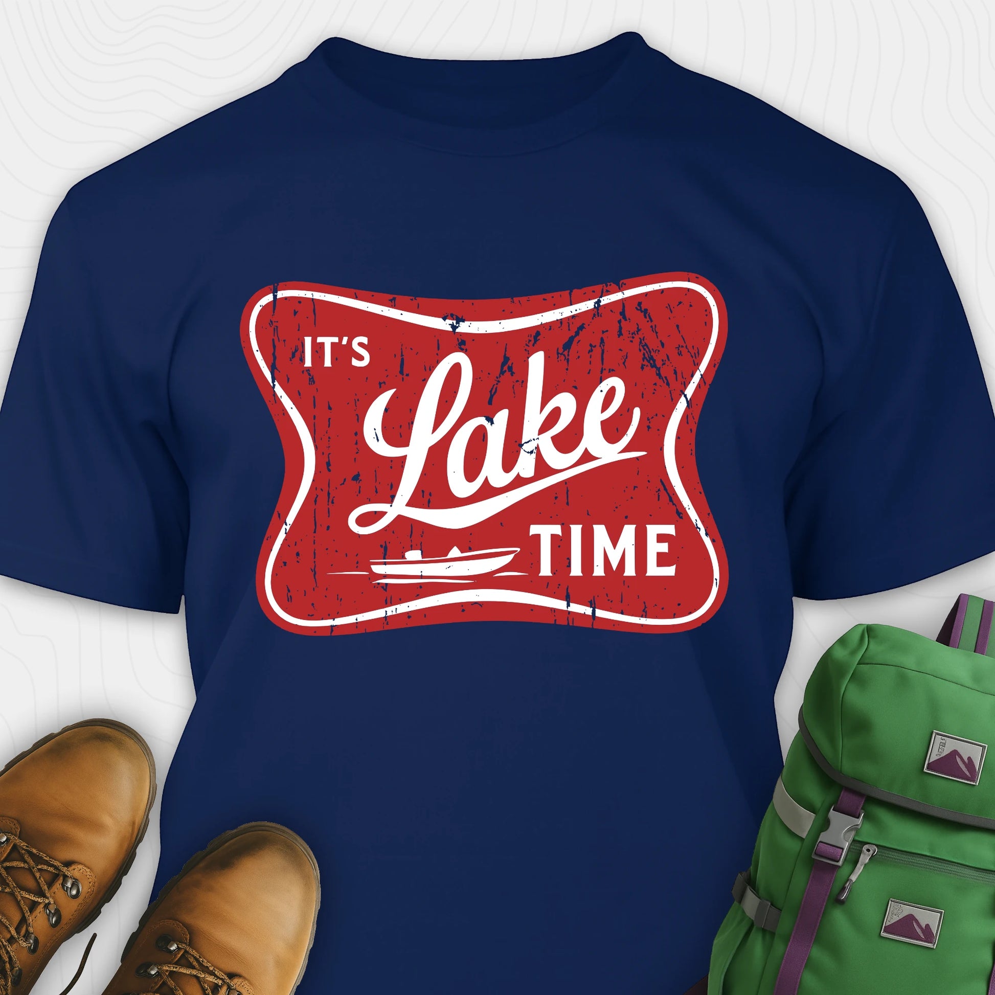 Navy lake t-shirt with retro “It’s Lake Time” graphic, featuring a red vintage lake badge design