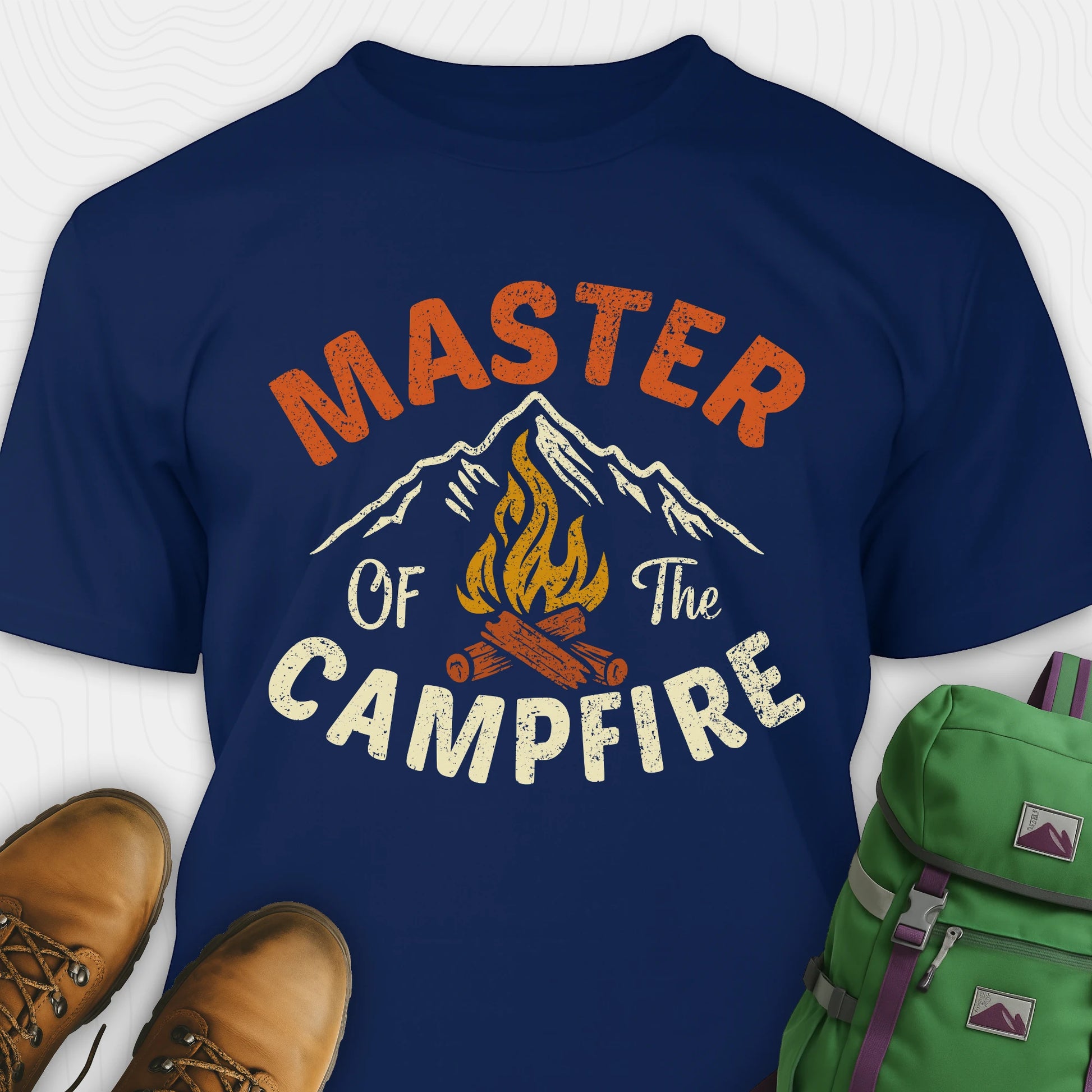 Navy fire starter shirt with retro campfire and mountain graphic, featuring "Master of the campfire" text
