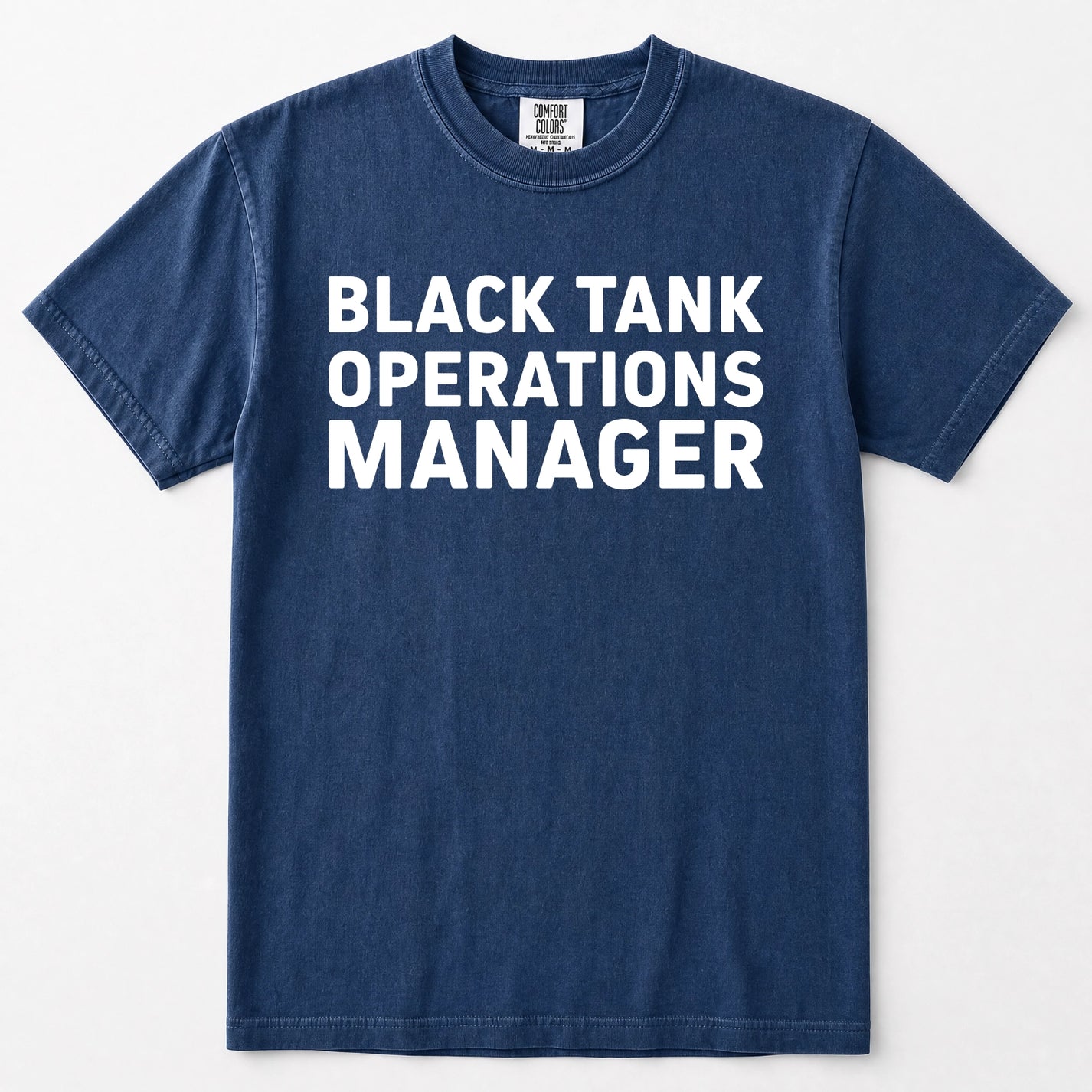 Navy blue short-sleeve t-shirt with the words 'BLACK TANK OPERATIONS MANAGER' printed in bold white capital letters across the chest, displayed flat against a light gray background.