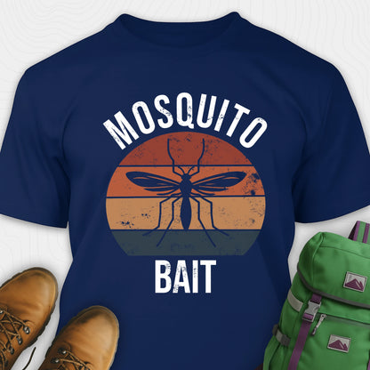 Navy blue mosquito shirt with mosquito graphic and 'Mosquito Bait' text, paired with brown shoes and a green backpack.