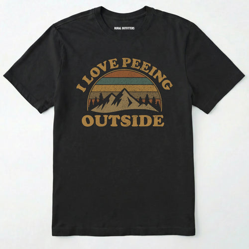 Black I love peeing outside shirt with a retro mountain graphic on a white background.