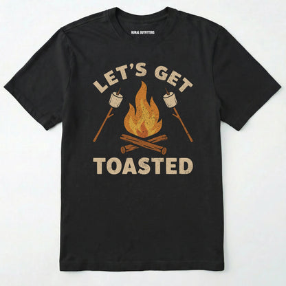 Black let⊙s get toasted shirt with campfire and roasting marshmallow graphic on a white background