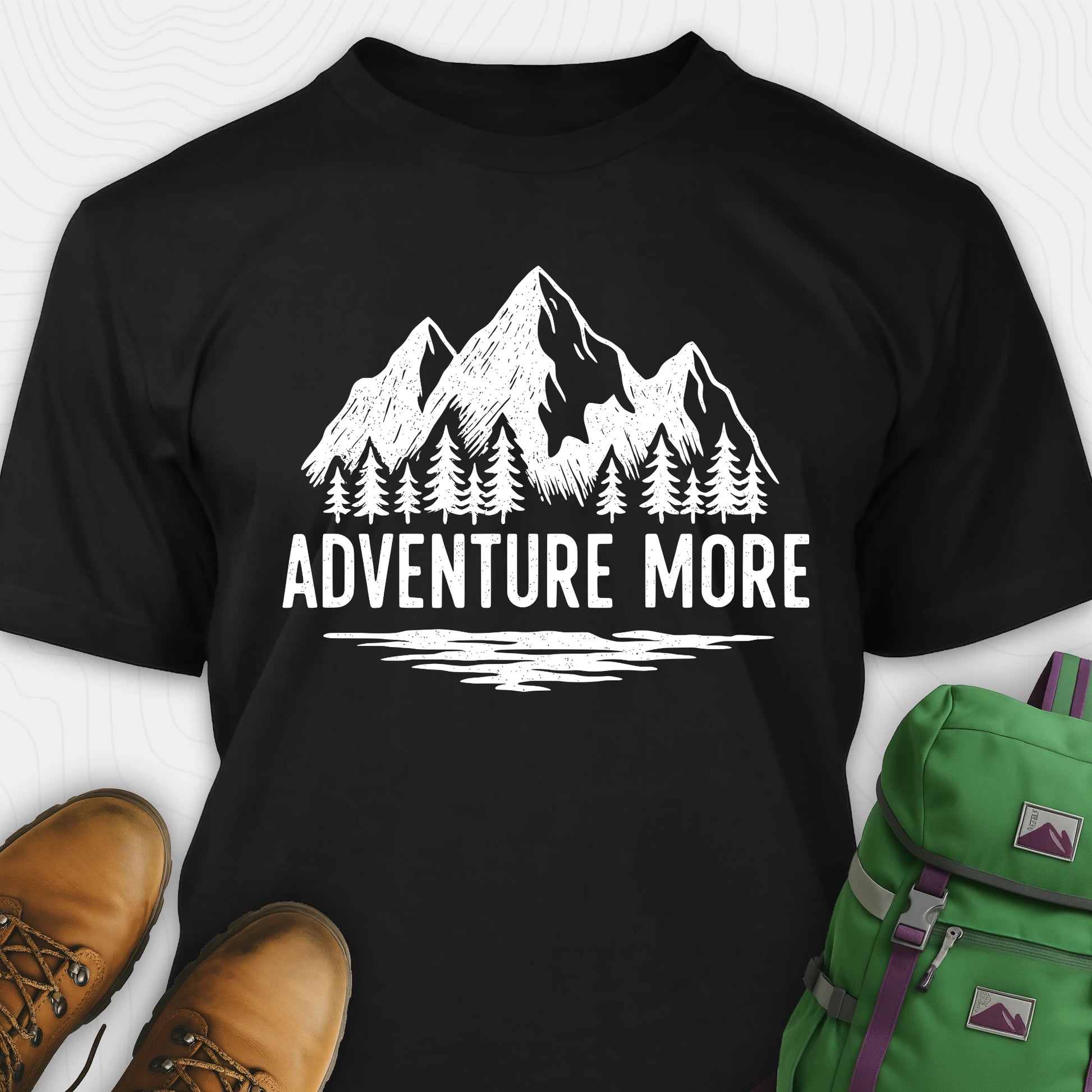 Black adventure t-shirt with white mountain and tree graphic on a soft cotton tee