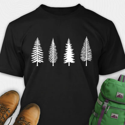 Black pine tree shirt with white minimalist forest graphic, brown boots, and a green backpack on a light gray background