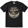 Black short-sleeve crewneck t-shirt with a vintage-style beige graphic on the chest. The graphic features a circular mountain and pine tree illustration with the text 'Get lost in Nature' and 'You hope you don't get eaten by bears'.
