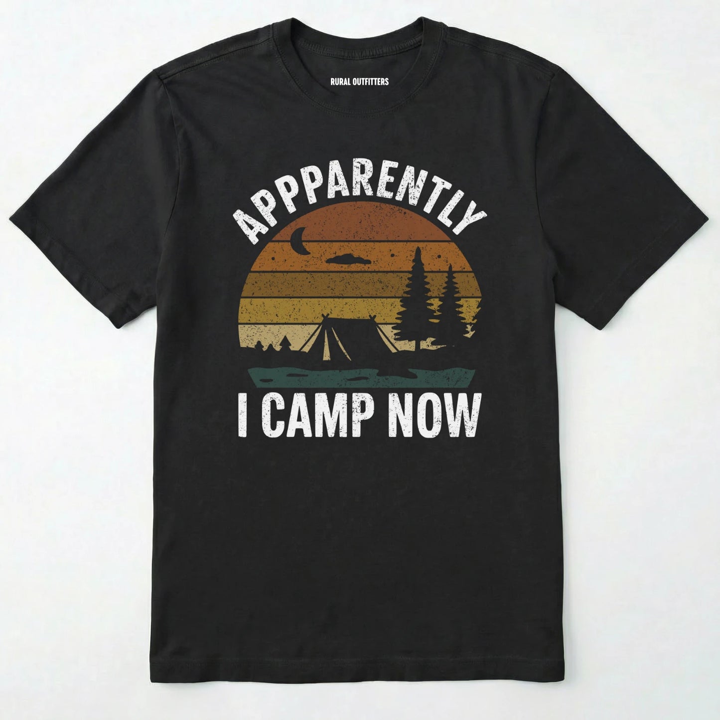 Black t-shirt with ⊜apparently i camp now⊝ in white text and a vintage sunset camping scene on a white background.