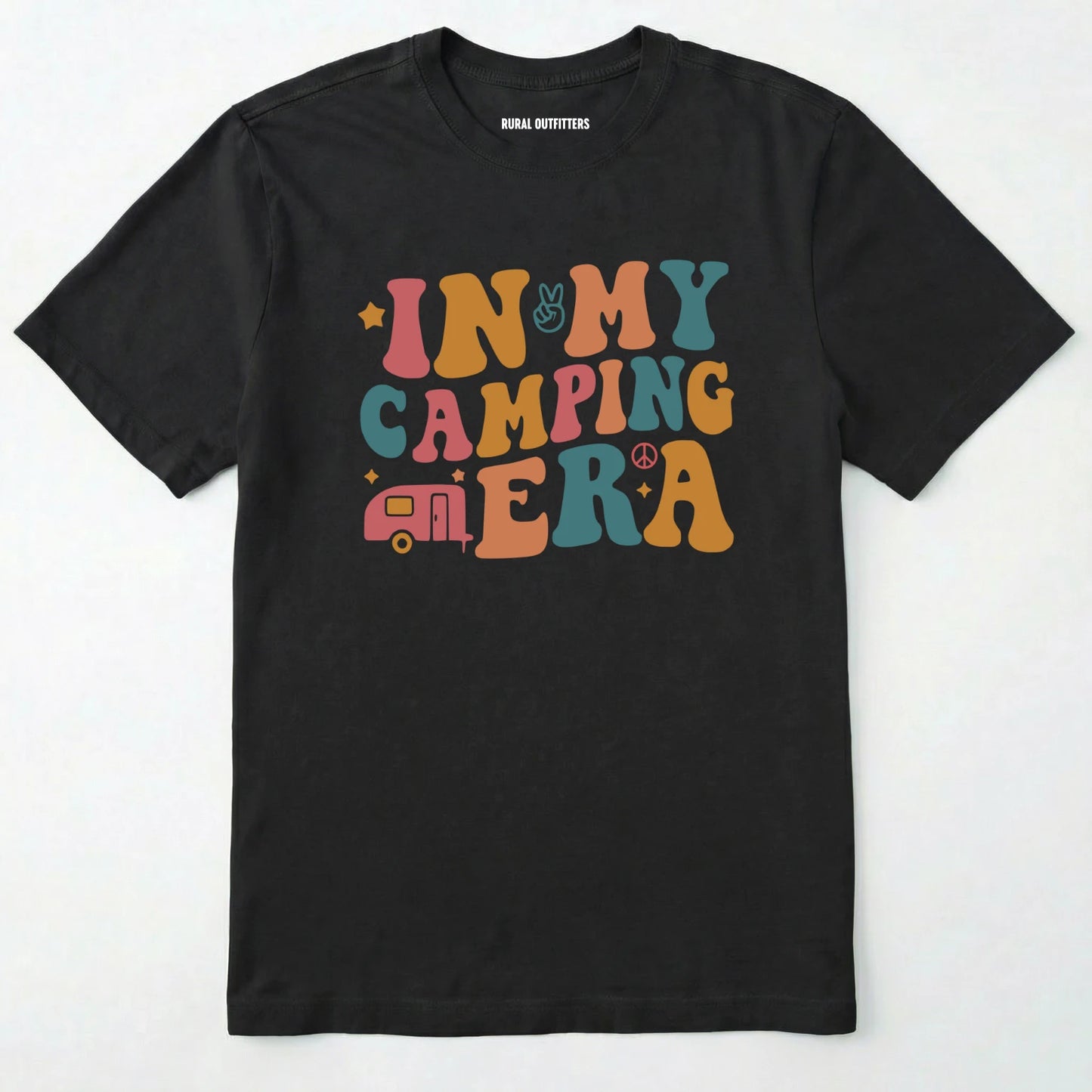 Black cute camping shirt with colorful retro ⊜in my camping era⊝ graphic on a white background.
