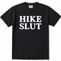 Black short-sleeve crewneck t-shirt with the words 'HIKE SLUT' printed in large white block letters across the chest, displayed flat against a white background.