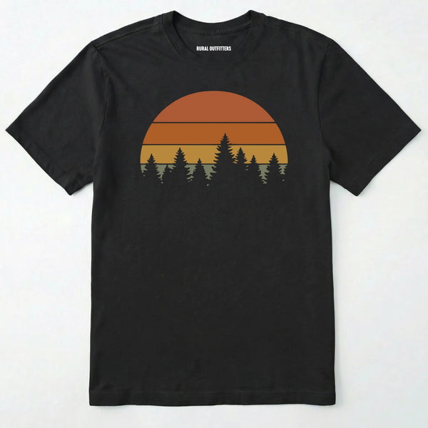 Black vintage sunset t-shirt with retro forest silhouette graphic on a white background.