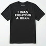 Black i was fighting a bear shirt with a bear scratch mark graphic on a white background.