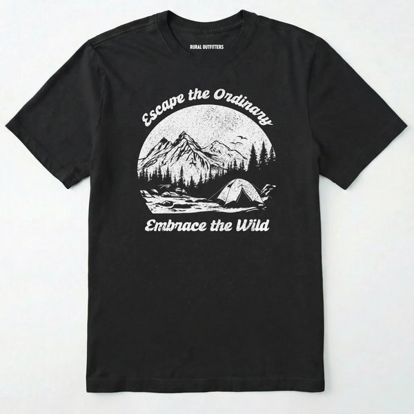 Black escape the ordinary t-shirt with mountain and tent graphic on a white background.