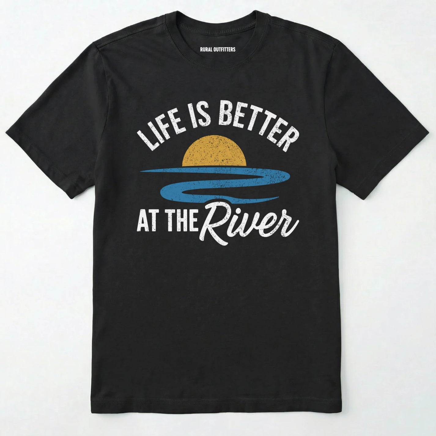 Black river shirt with 'life is better at the river' design, paired with brown boots and a green backpack on a light grey background.