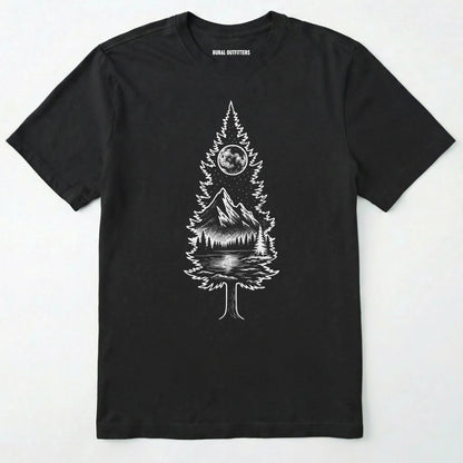 Black tree t-shirt featuring a detailed white graphic of a pine tree silhouette. the tree outline contains a landscape scene: a mountain peak rising over a forested shoreline, with its reflection visible in a lake below. above the mountain is a starry night sky and a full or partial circle representing the moon or sun.