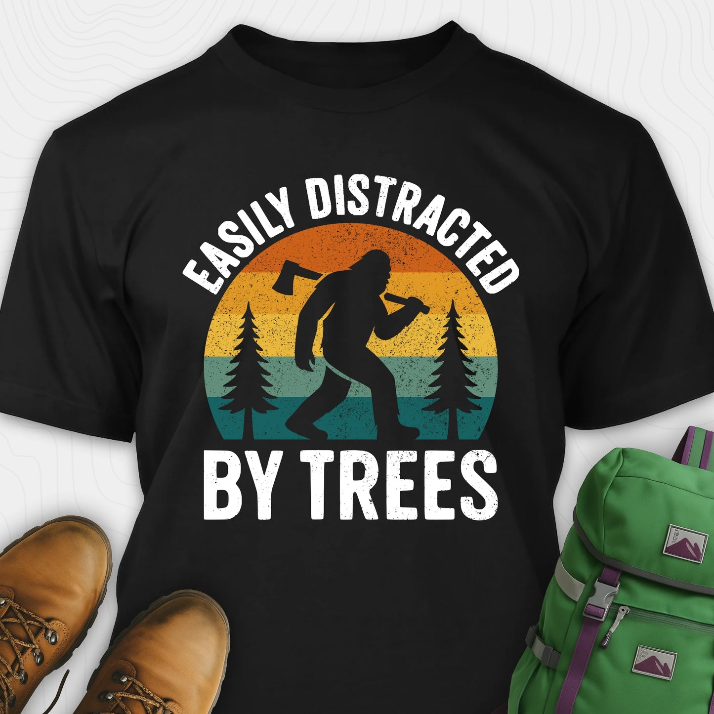 Black funny sasquatch shirt featuring bigfoot silhouette and trees