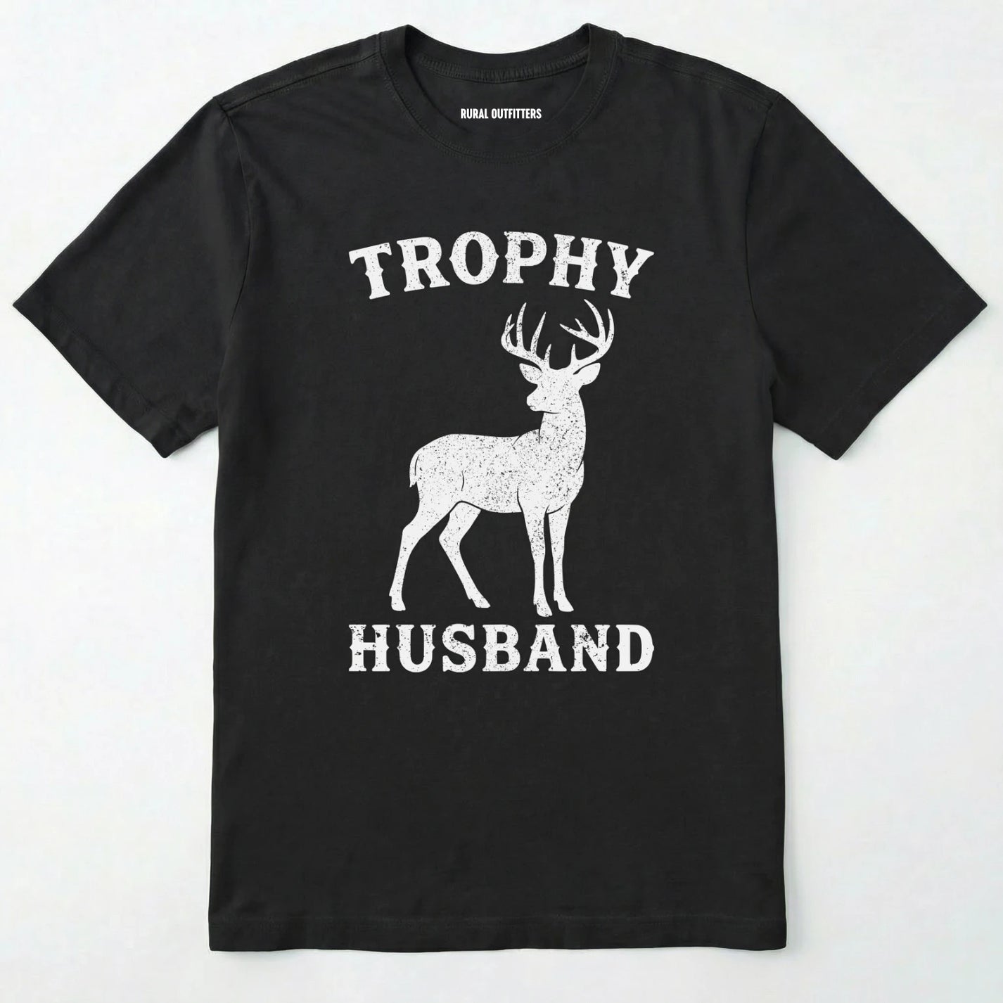 Black t-shirt with white graphic of a deer and text 'trophy husband' on a white background