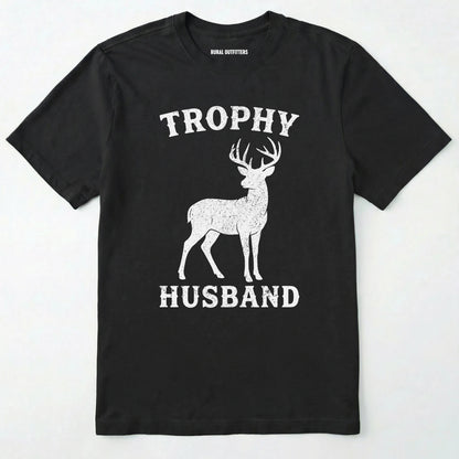 Black t-shirt with white graphic of a deer and text 'trophy husband' on a white background